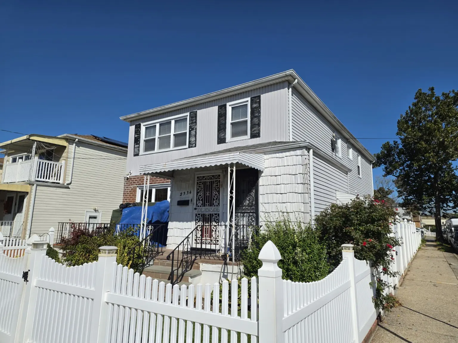 Corner exterior view and fenced yard