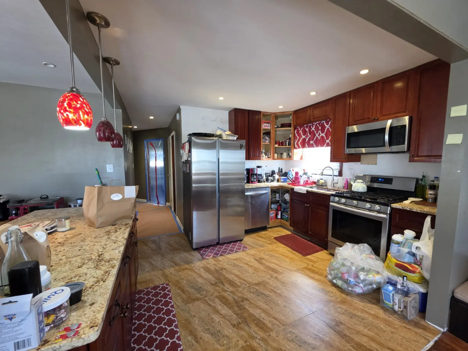 Kitchen with wood cabinetry and stainless appliances