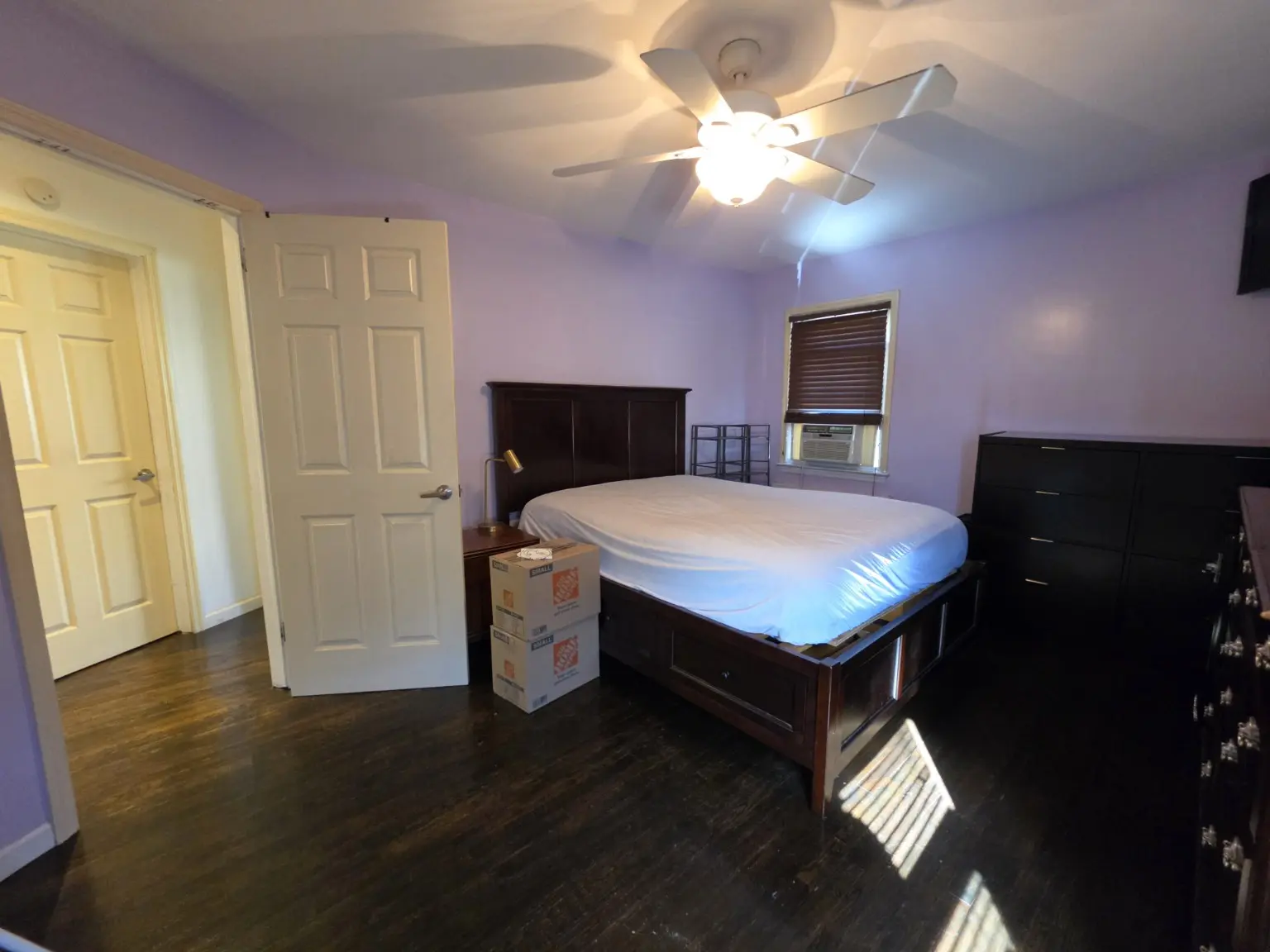 Additional bedroom with hardwood flooring